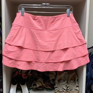 Athleta tennis skirt in coral and white